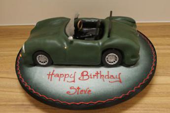 Jaguar Car Badge 70Th Birthday Cake - CakeCentral.com