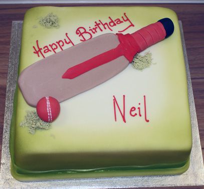 Cricket ball and bat cake